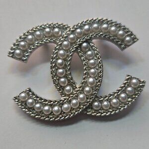 CC brooch